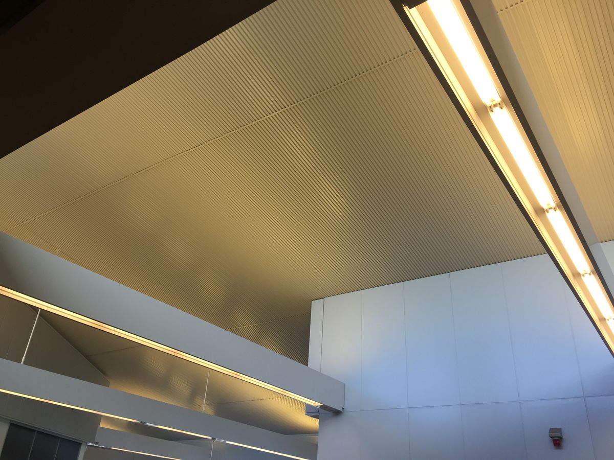 S-Shape baffle ceiling at airport terminal