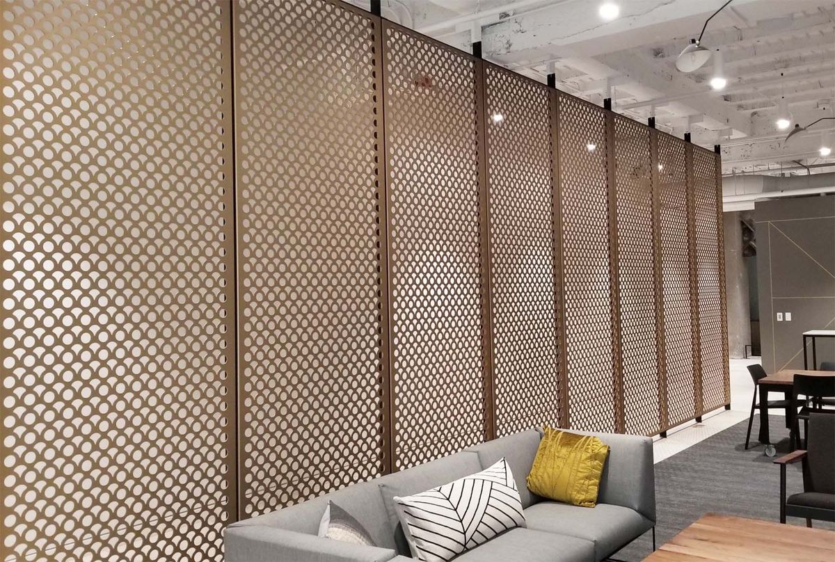 Back face treatment of perforated acoustic wall panels